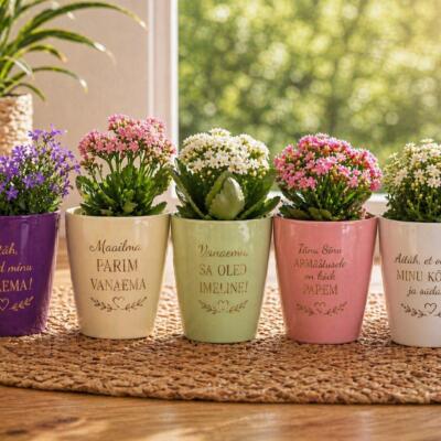 Lillepott (keraamiline) tekstiga